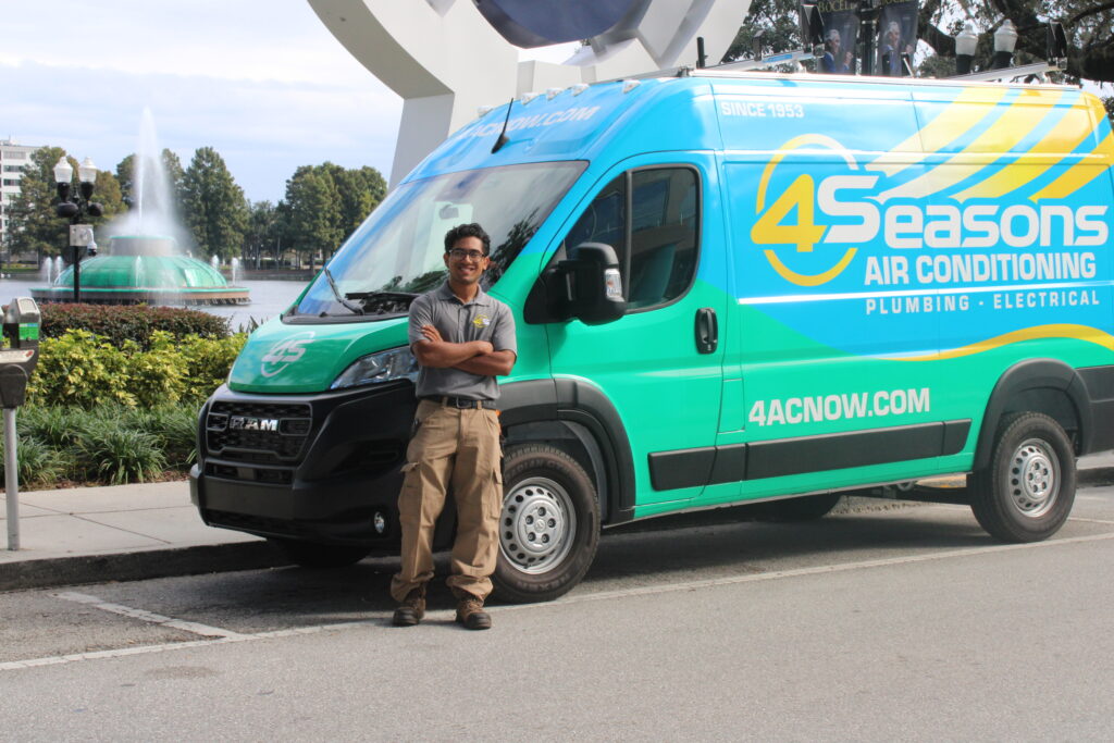 HVAC Tech Standing in front of Lake Eola Orlando